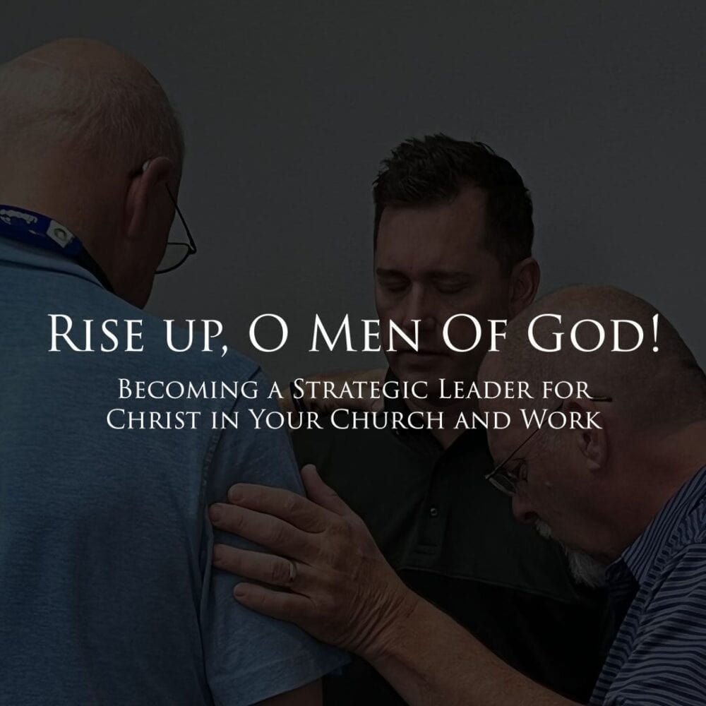 three men praying together