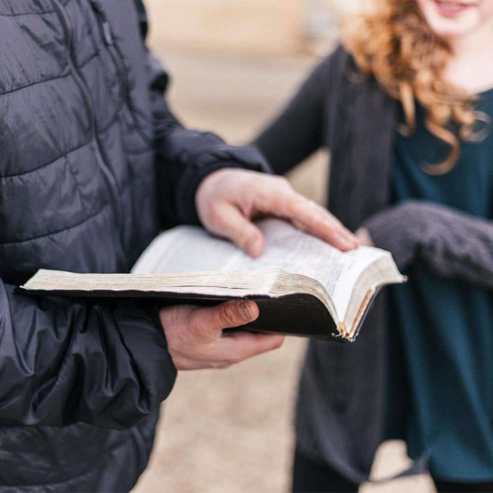 Pastor holding bible